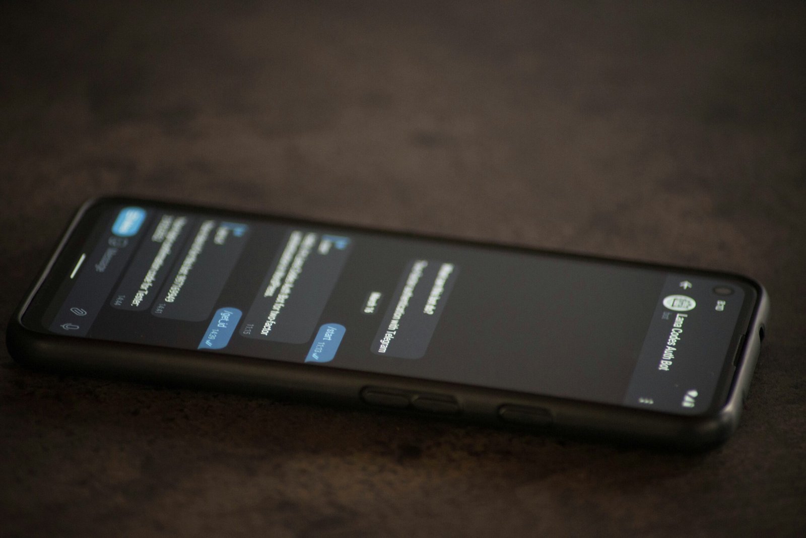 a close up of a cell phone on a table